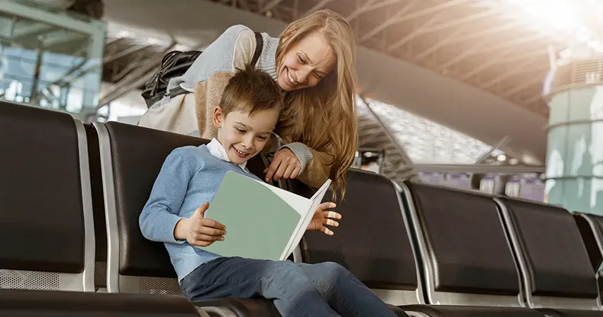 boy learning at airport