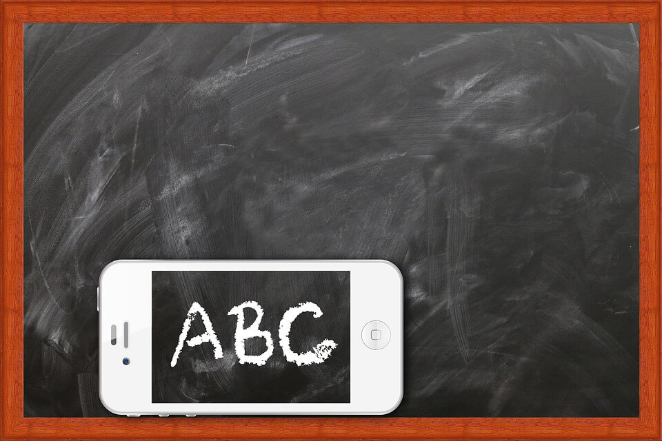 A smartphone on a blackboard